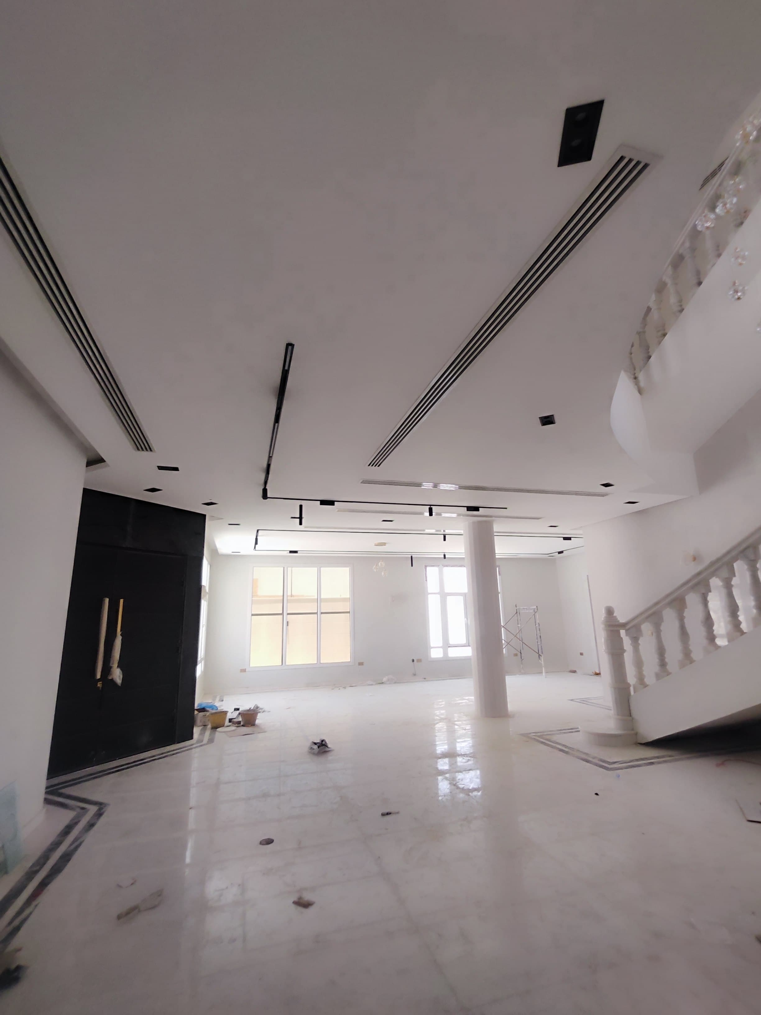 Gypsum board false ceiling with cove lighting in a Doha villa (view 2)